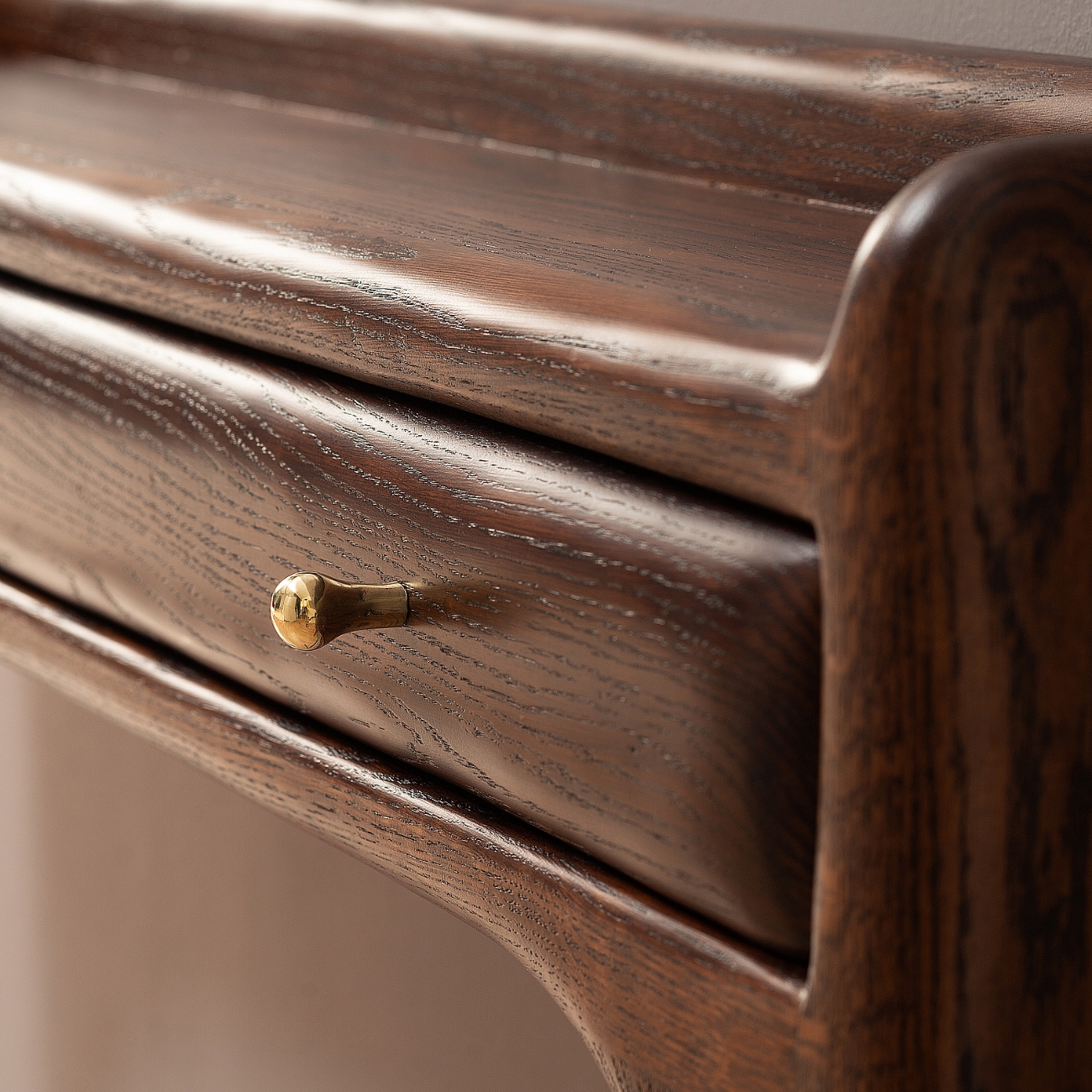 Drawer detail of CT 01 console by Tomasz Omachel Studio with brass hardware