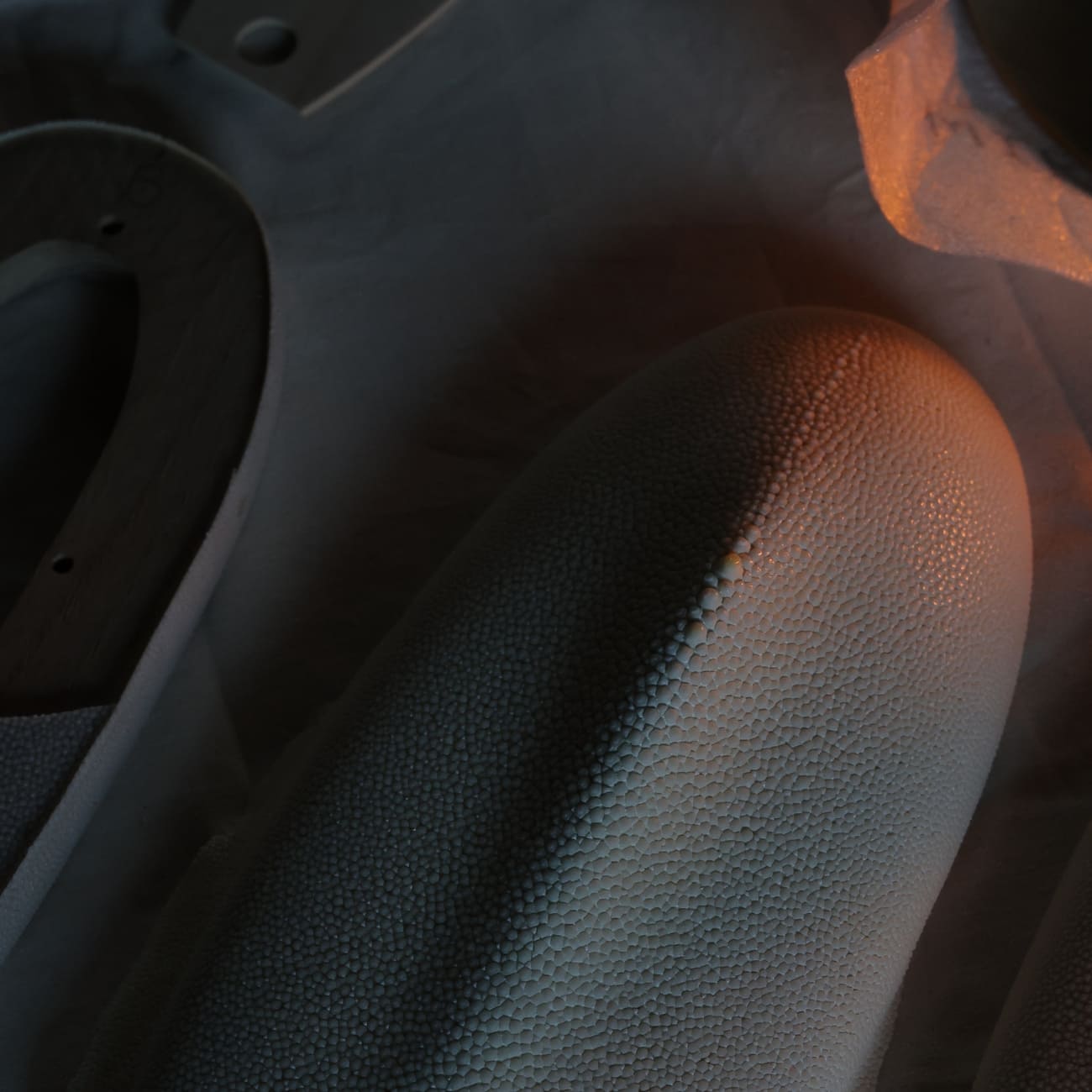 Close-up of shagreen texture illuminated by the concealed light source in Mother of the Light