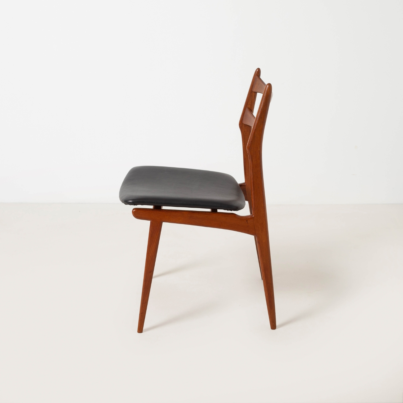 Habeo Boomerang chair, rear three quarter view.