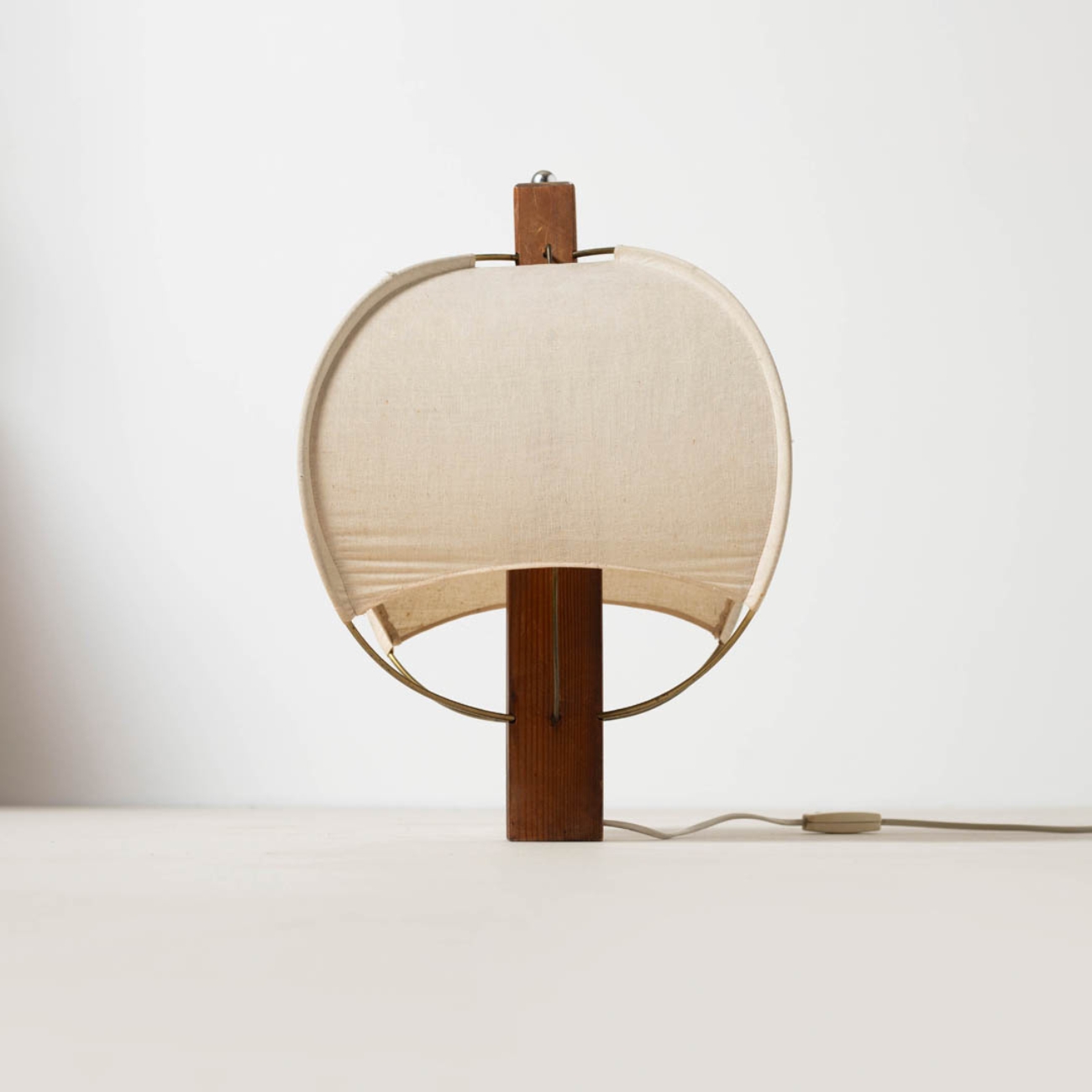 Wooden and fabric table lamp, rear view.