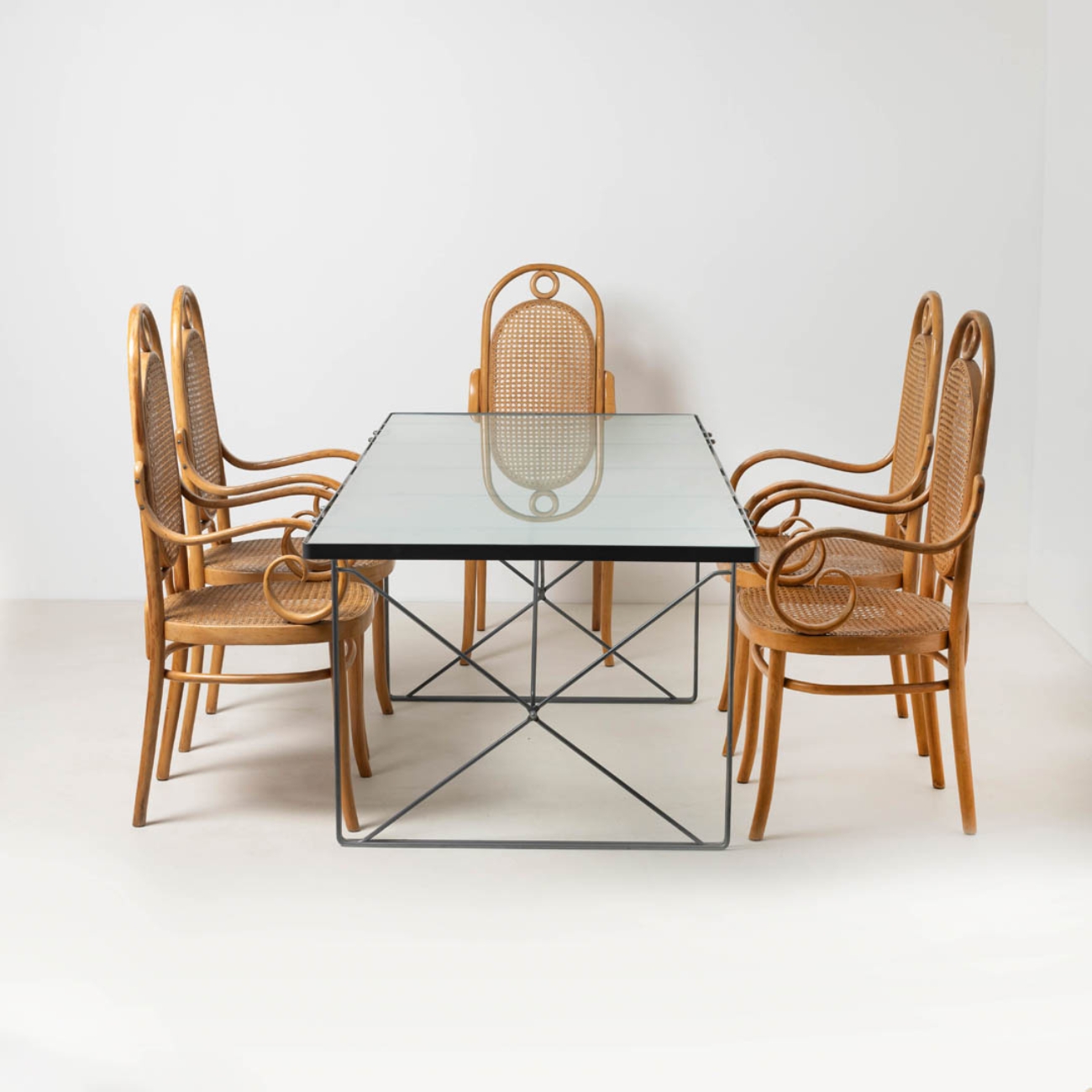 Characteristic curved beechwood elements of the Bentwood chair.