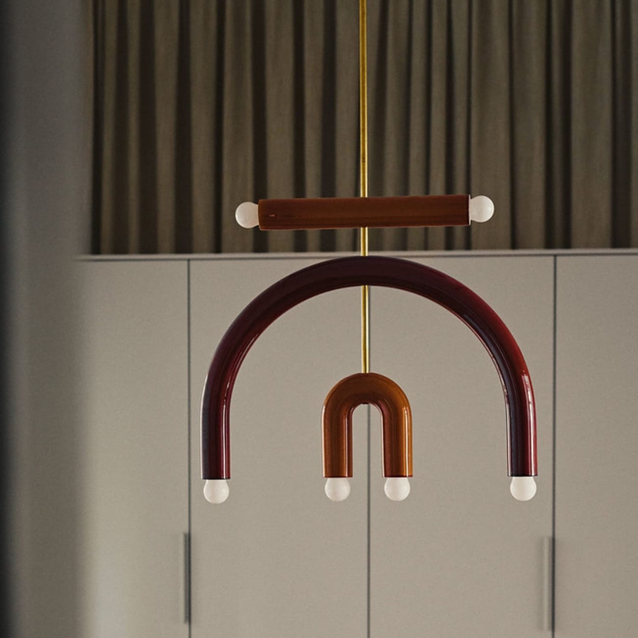 TRN handcrafted ceramic pendant light with brass details designed by Pani Jurek.