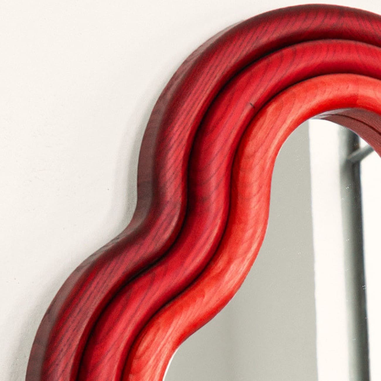Solid ash wood designer wall mirror by Pani Jurek, part of the TRN series, selected by maybel for collectors of functional art and contemporary design.