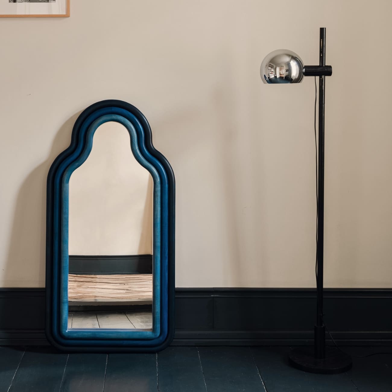 Collectible ash wood mirror by Pani Jurek with sculptural layered frame, available through maybel, a gallery of contemporary craftsmanship and design.